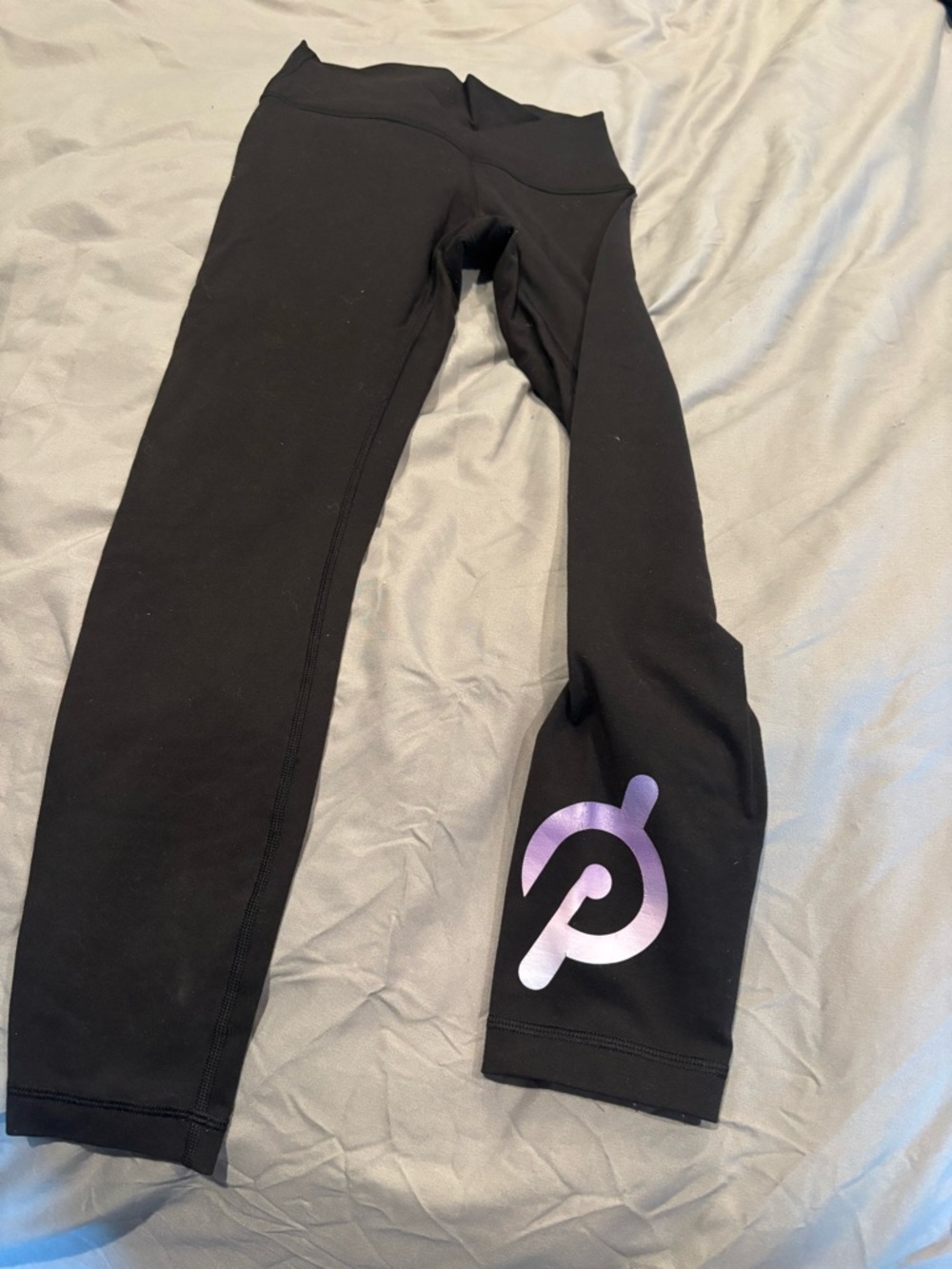 Limited edition Peloton x Lululemon Wunder Unders with Purple Logo
